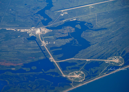 Sometimes you're in the right place at just the right second. Such was the case on a commercial Southwest flight from Baltimore to Palm Beach. We flew over Kennedy Space Center, and I happened to be on the right side of the plane. The two circles in front are the launch pads used in the Space Shuttle program.