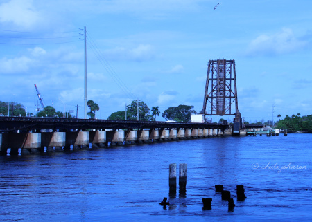 The train bridge over the St. Lucie River, downtown Stuart, Florida, is a blue vision at dusk.